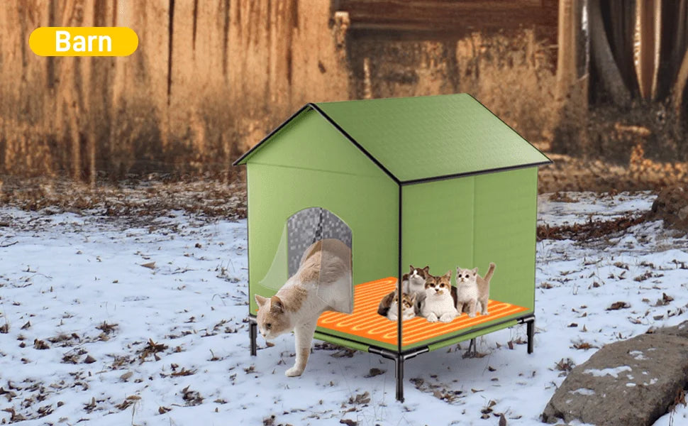 A barn-style heated outdoor house for cats, keeping them warm on a snowy field.