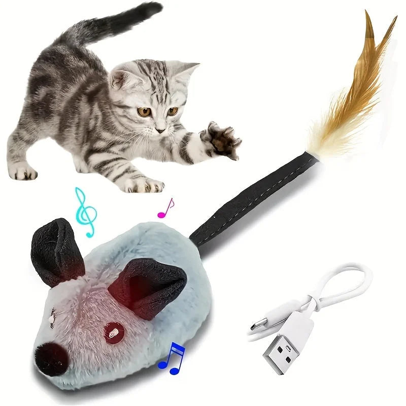 Kitten engaging with a musical interactive cat toy mouse featuring USB charging – designed to keep cats active.