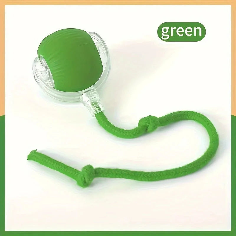 Green cat rolling ball toy with soft rope for interactive play.