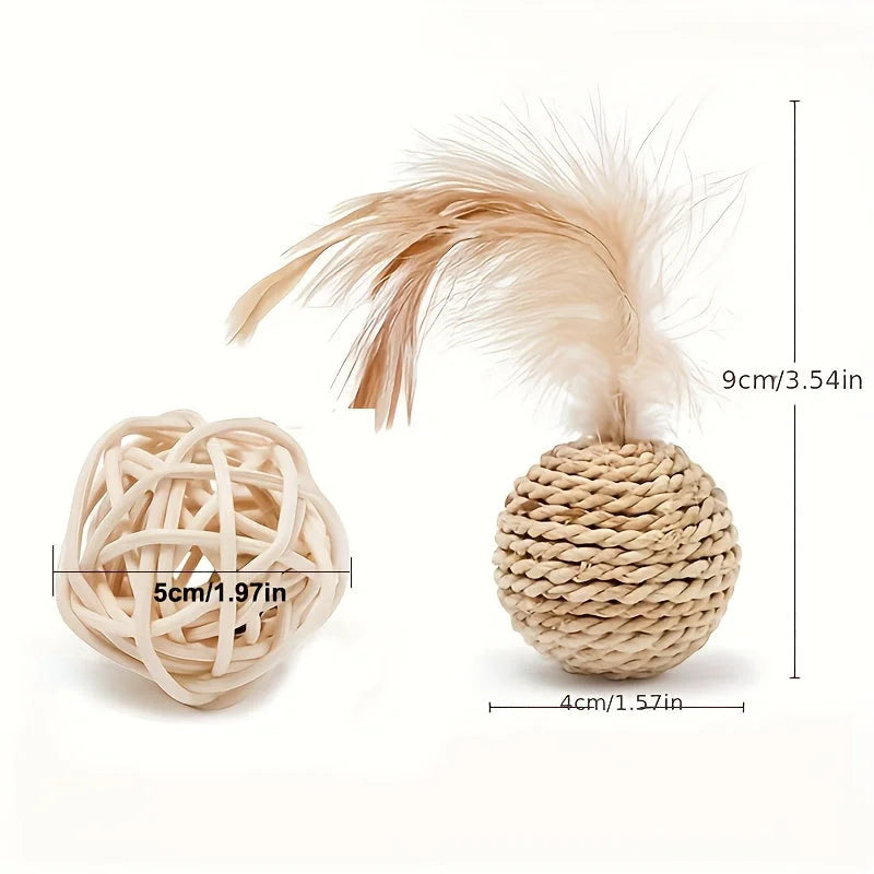 A cat scratch ball toy with feather on top, shown with dimensions labeled in cm and inches, alongside a rubber ball.