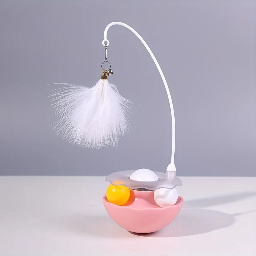 A white and pink cat toy feather wand with a fluffy feather attachment, designed to entertain cats.