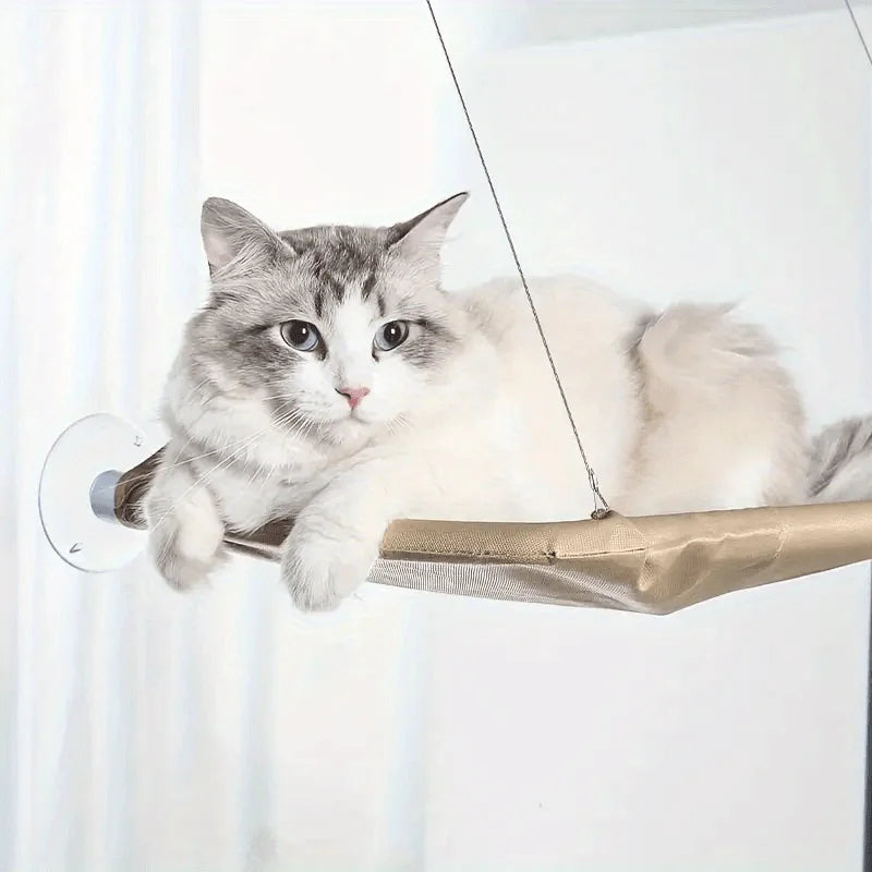 A cat comfortably resting on a spacious Cat Window Perch for Large Cats, ideal for large cats to relax in peace.