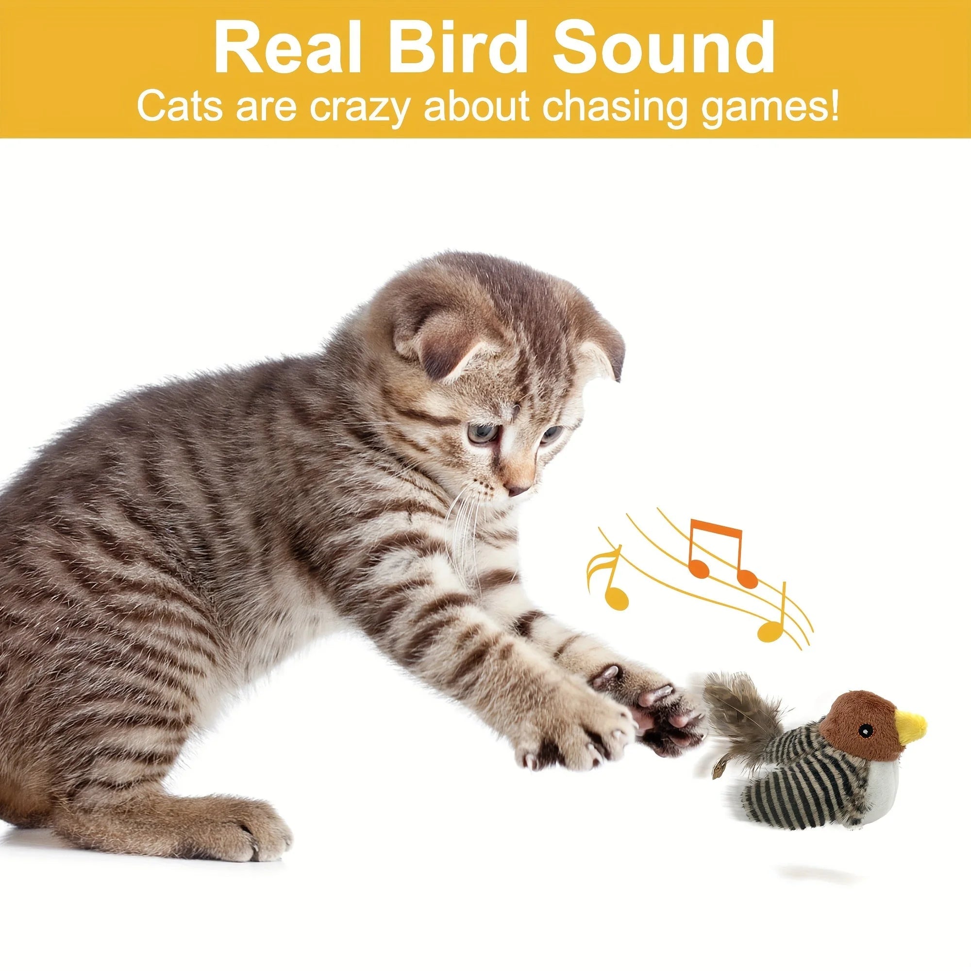Kitten leaping to catch a chirping bird cat toy that produces real bird sounds.