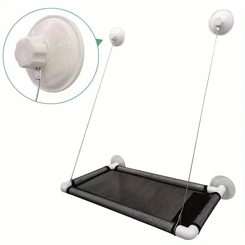 Close-up of suction cups securely holding a Cat Window Bed in place. Enjoy watching your cat rest comfortably on the windowsill.