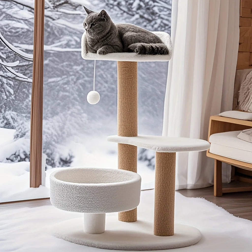 A cozy scene featuring a cat relaxing on top of a comfortable cat scratching post and tree beside a snowy outdoor background.