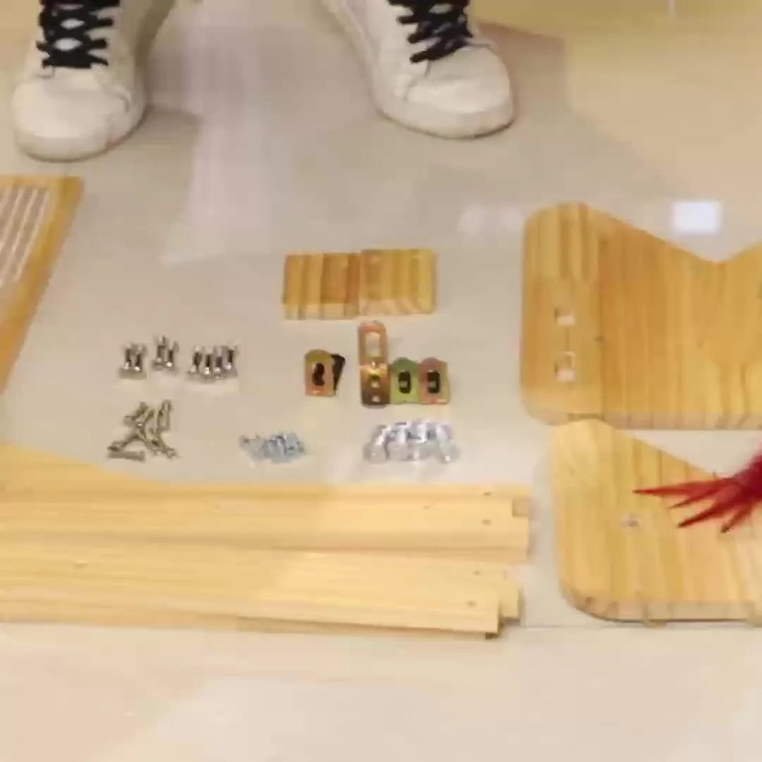 Parts and hardware for assembling a large cat scratching post, neatly laid out for easy construction.