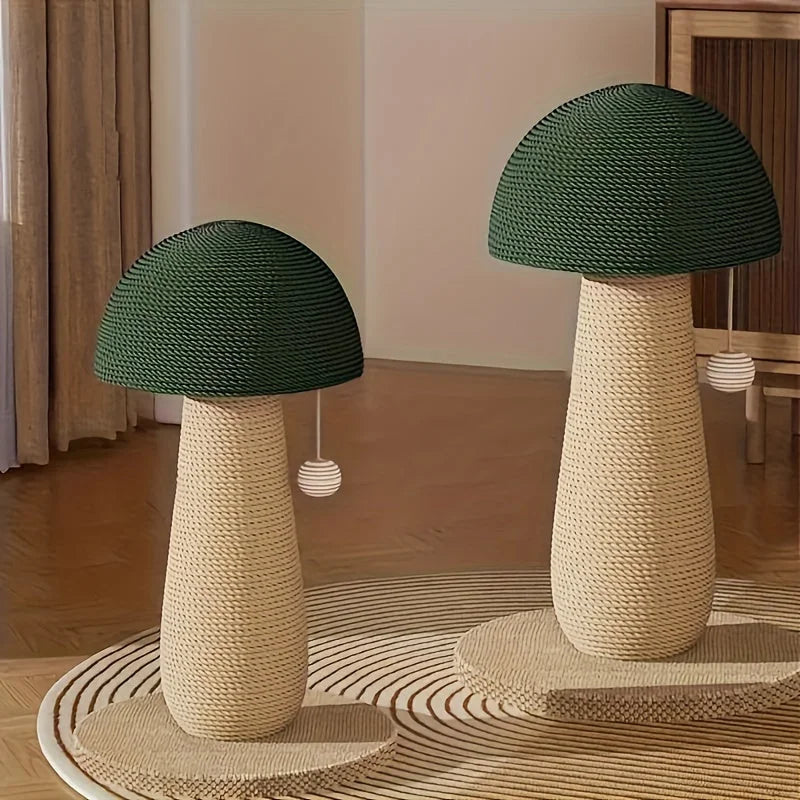 Two stylish mushroom-shaped good scratching posts for cats placed together on a modern rug.