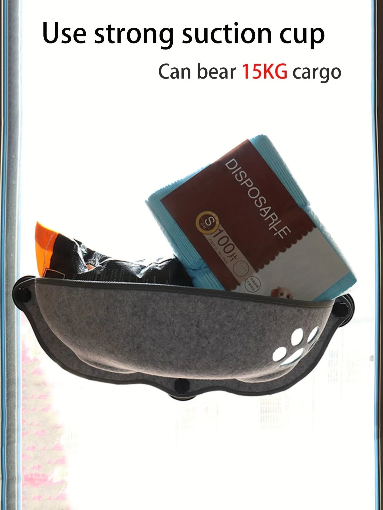 A grey felt Window Perch for Cats demonstrates a 15kg weight capacity by securely holding heavy items on a mounted window.