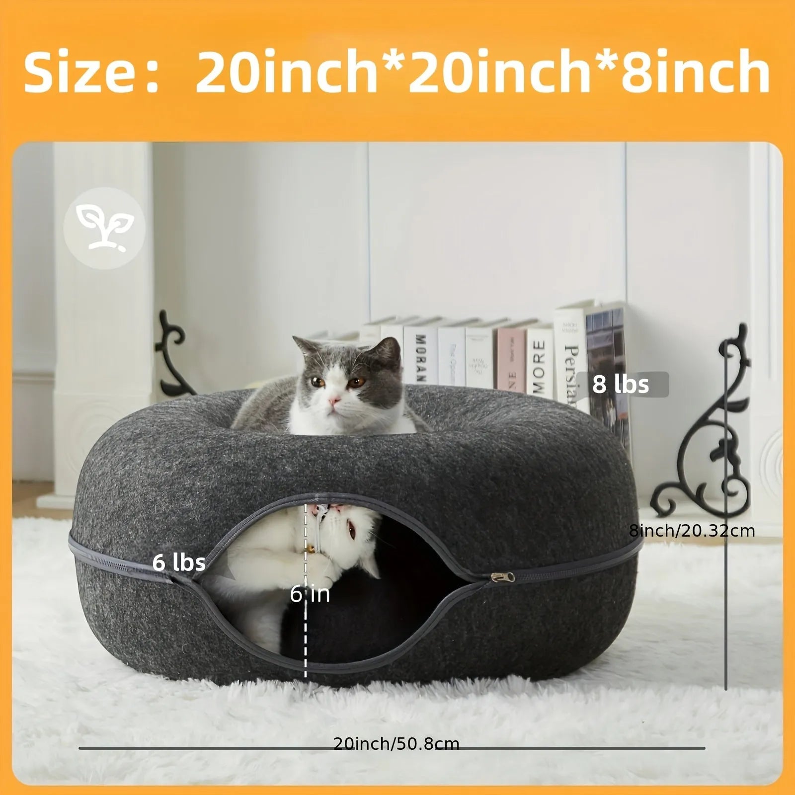 Black cat bed and tunnel measuring  with one cat sitting on top and another enjoying the interior tunnel space