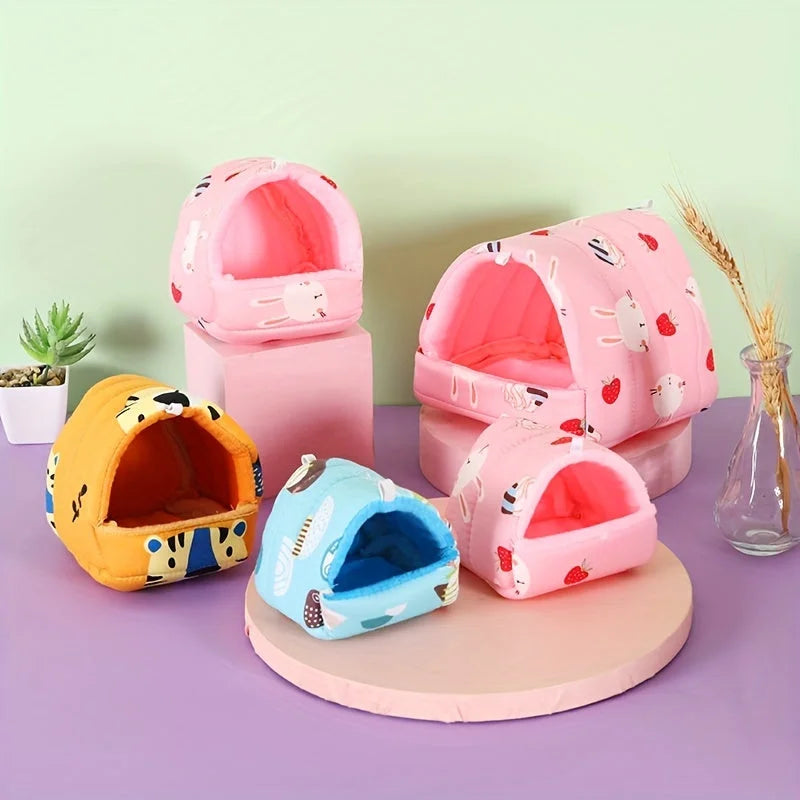 Assorted cat play houses in pink, yellow, and blue colors displayed attractively.