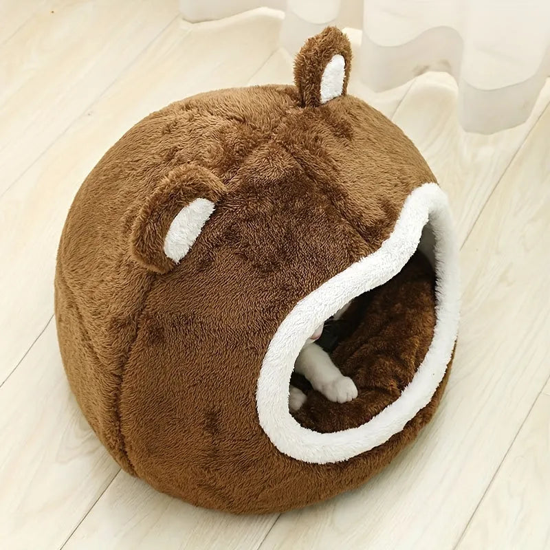 Bear-themed warm cat bed displayed in a room with a cozy ambiance.