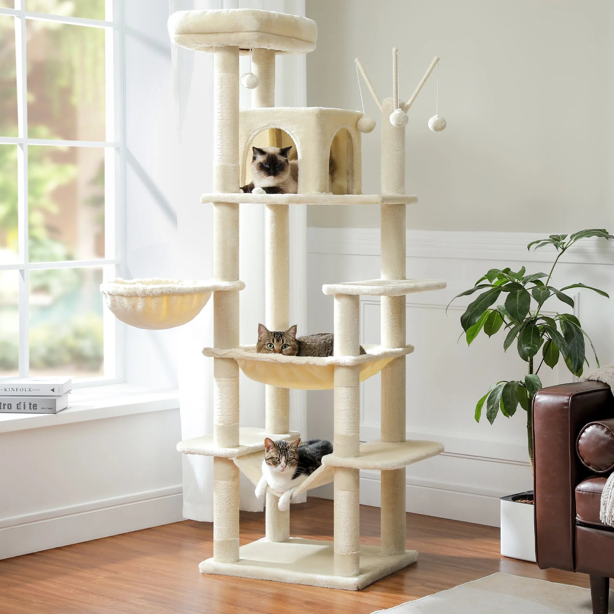 Multi-level beige cat condo for large cats, featuring hammocks, lounging spaces, and a sturdy design for multiple cats.