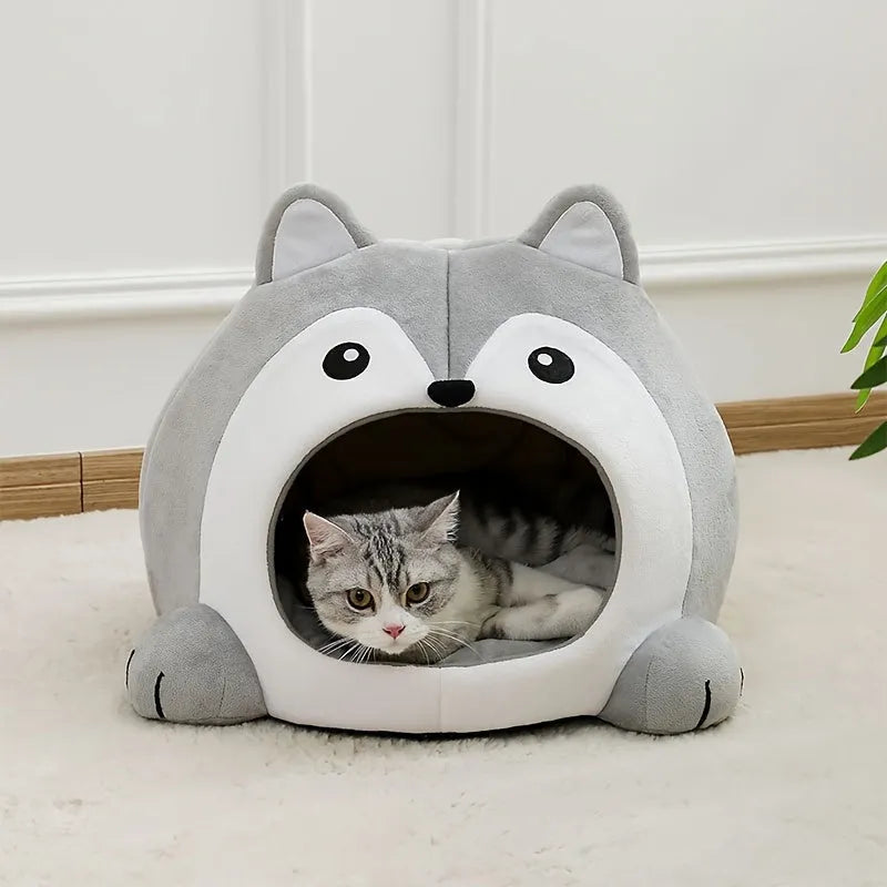 Plush cat bed with a charming animal face design, providing a warm and secure resting space