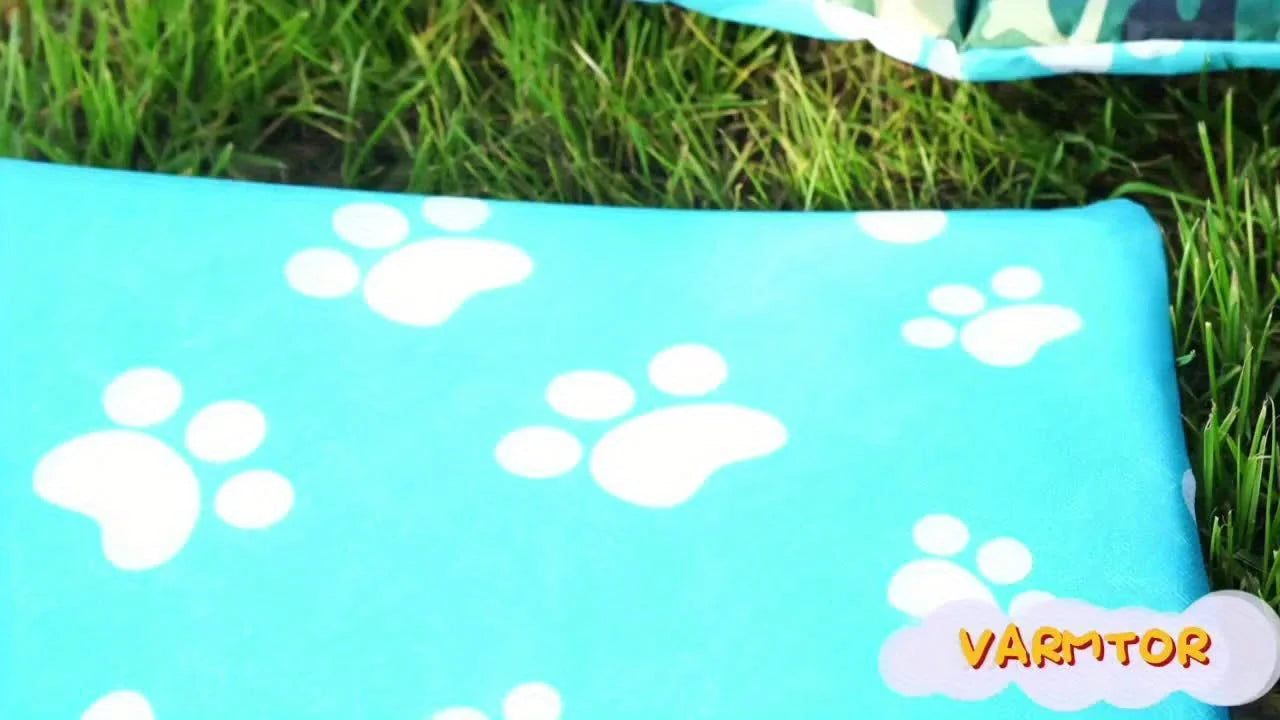 Close-up of the paw-print patterned floor mat for the best outdoor cat house for winter.