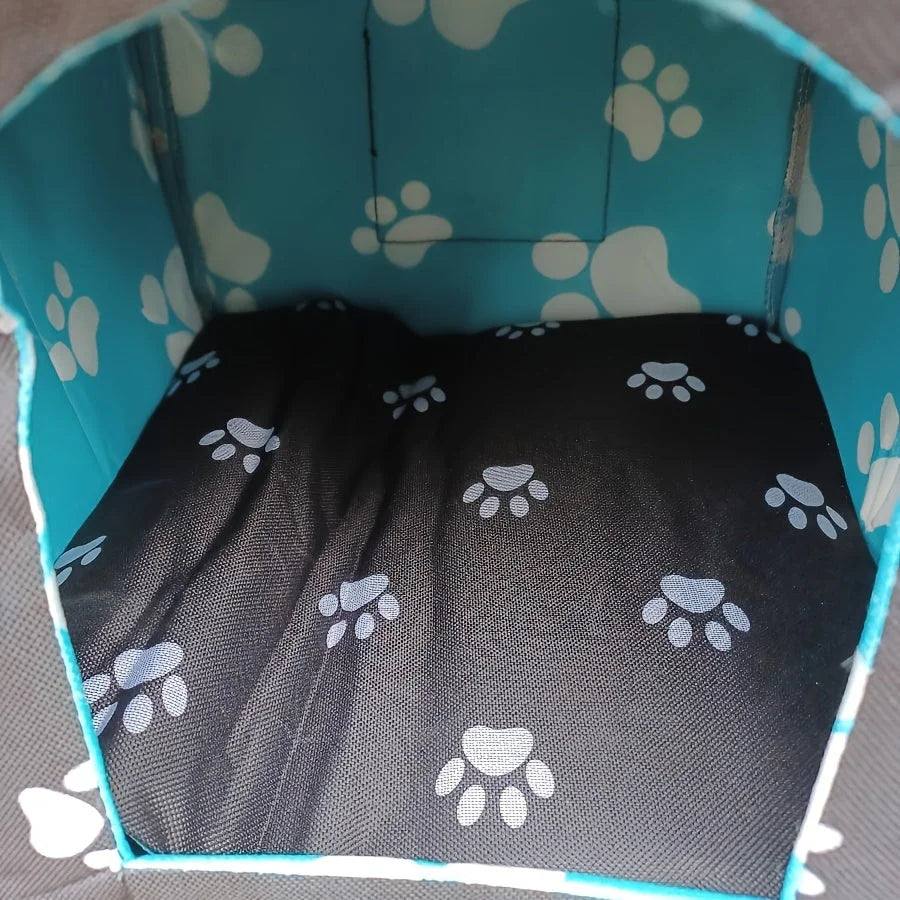  A small dog inside the best outdoor cat house for winter, demonstrating its spacious and comfortable interior.