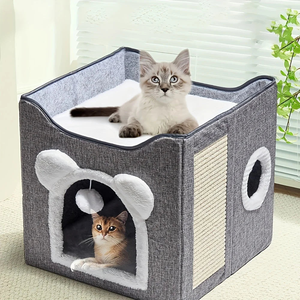 Cozy design of the best outdoor cat house featuring a soft interior and playful hanging toy.