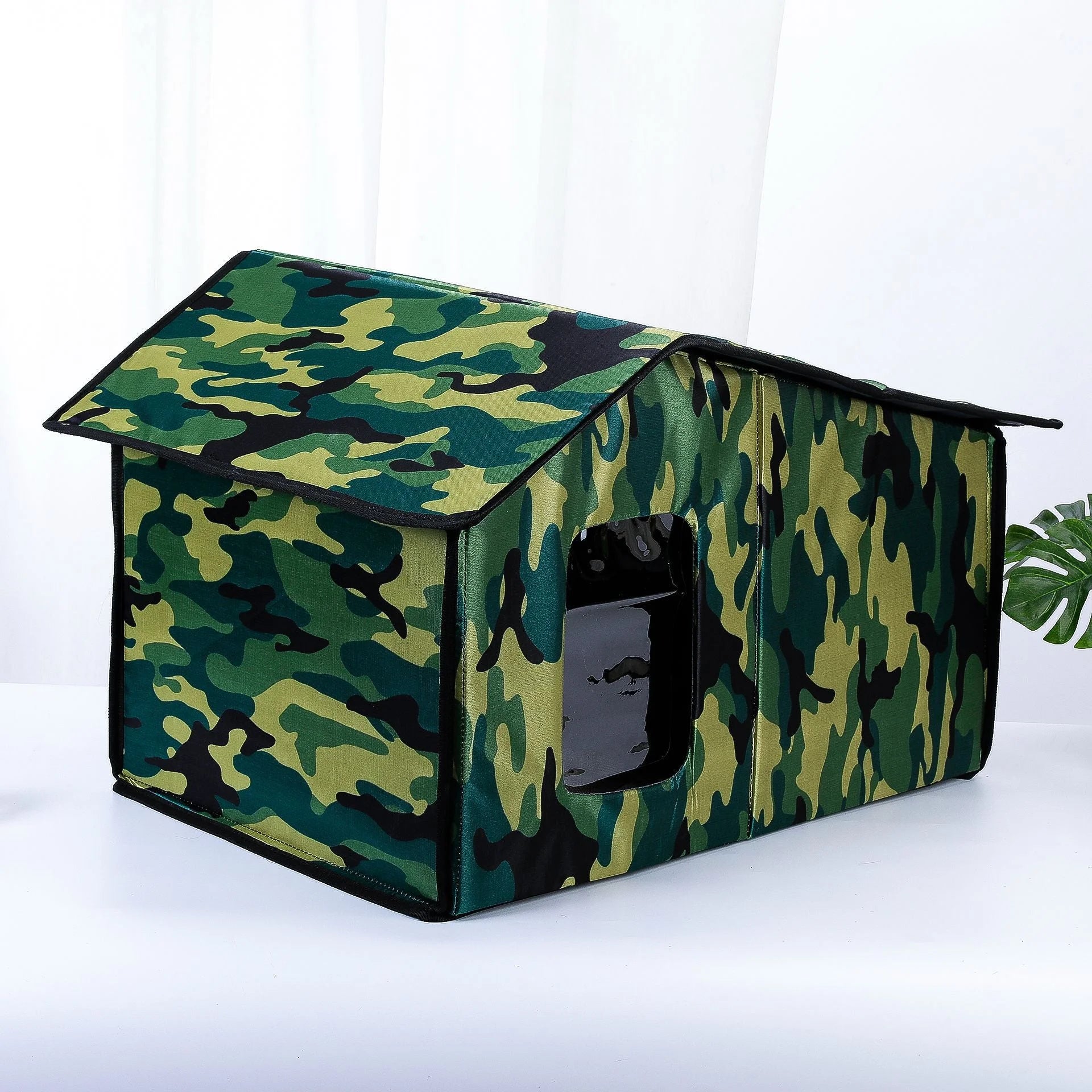 Camouflage waterproof top-rated outdoor cat house with durable fabric for all weather conditions.