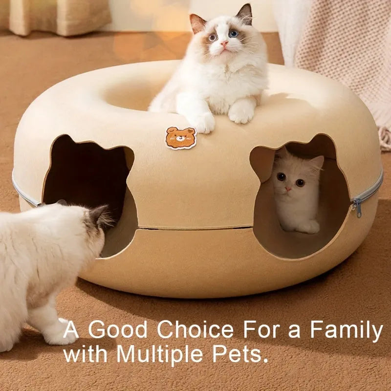 A beige cat tunnel bed featuring multiple entrances, ideal for families with multiple cats, shown with playful and curious cats.