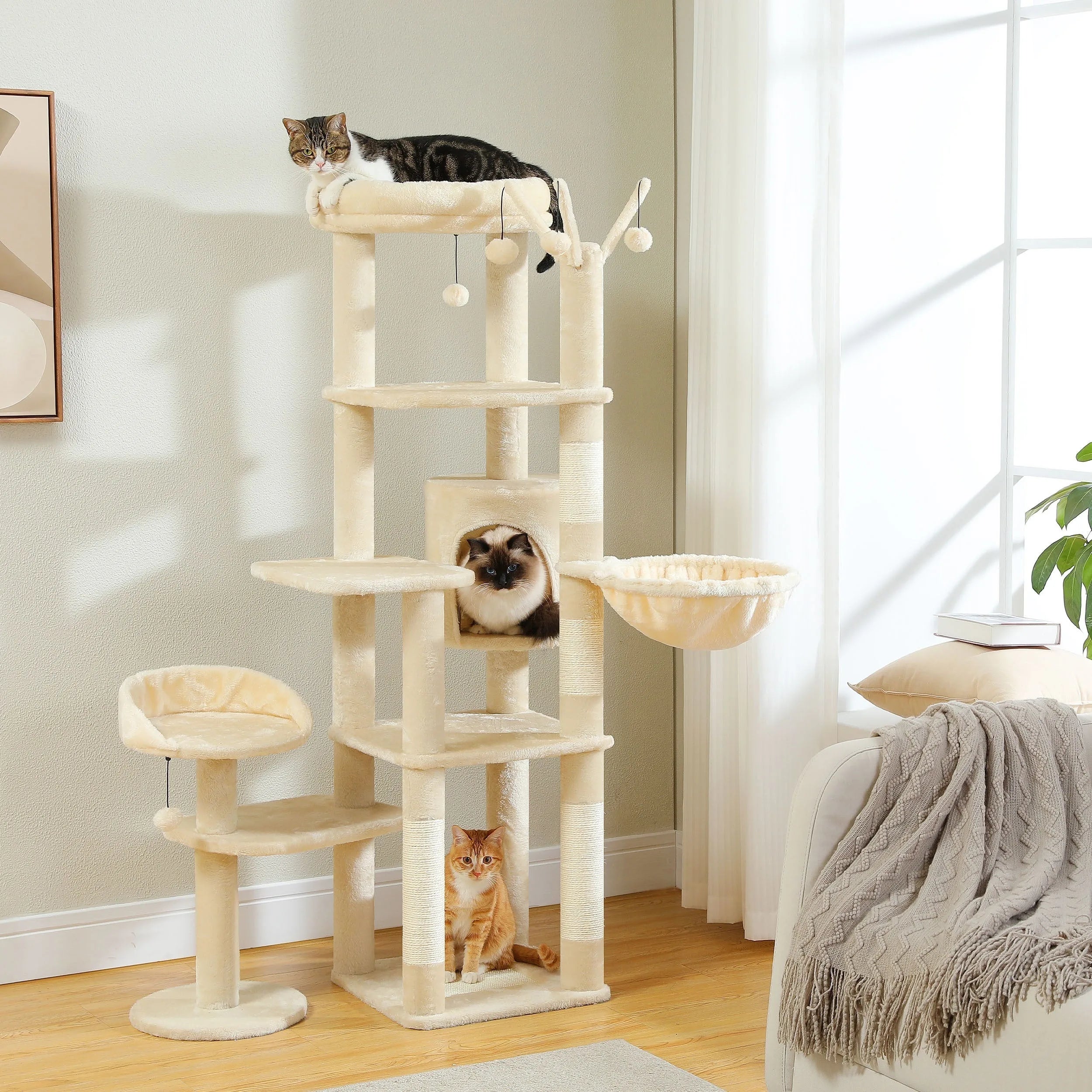 A modern gray cactus cat tree with interactive toys, a comfortable hammock, and spacious perches for cats to relax and play."