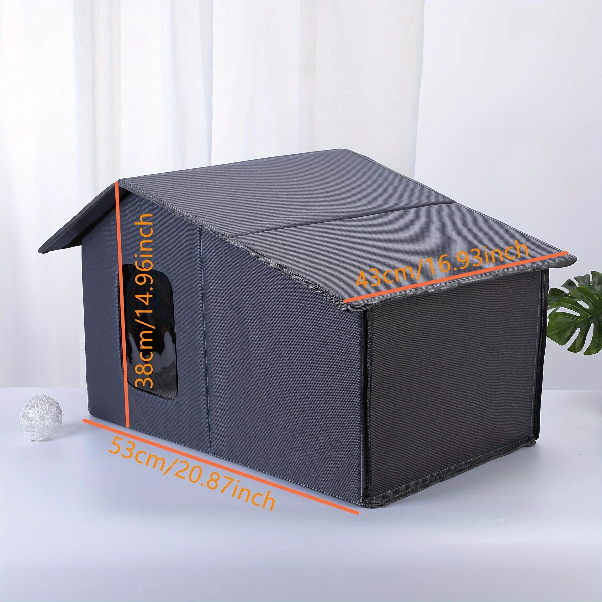 Dimensions of gray top-rated outdoor cat house, measuring 53cm x 43cm x 38cm for outdoor cats.