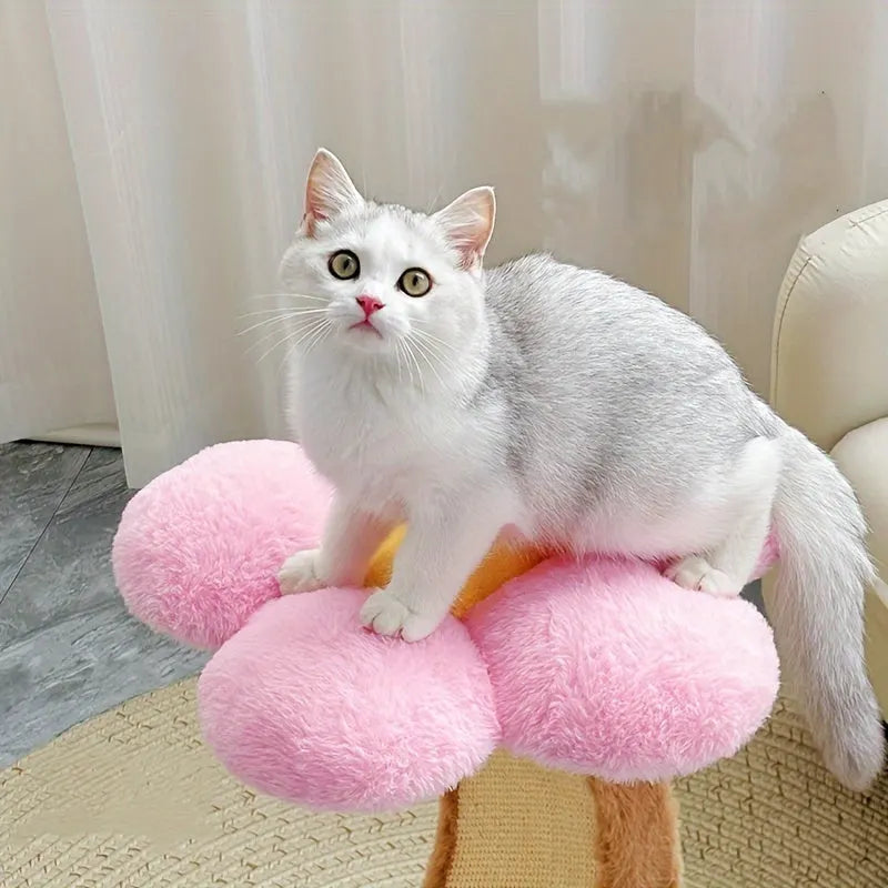 A playful Flower Cat Tree with a pink flower top, showcasing a cat sitting confidently on the soft and elevated surface.