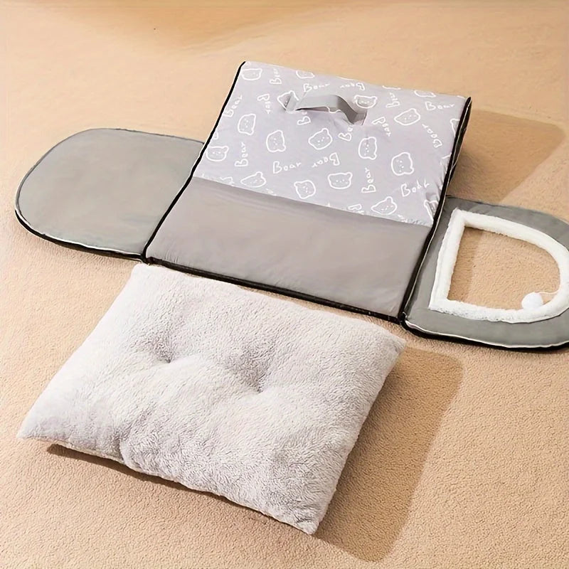 A foldable heated cat house with a fluffy cushion and compact design for portability and comfort.