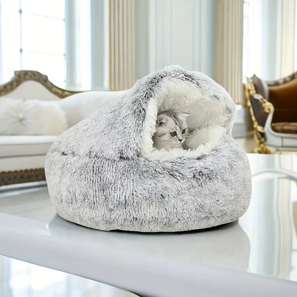 Gray Furb Cat Bed placed in a luxurious living room, offering a stylish and comfortable pet accessory.
