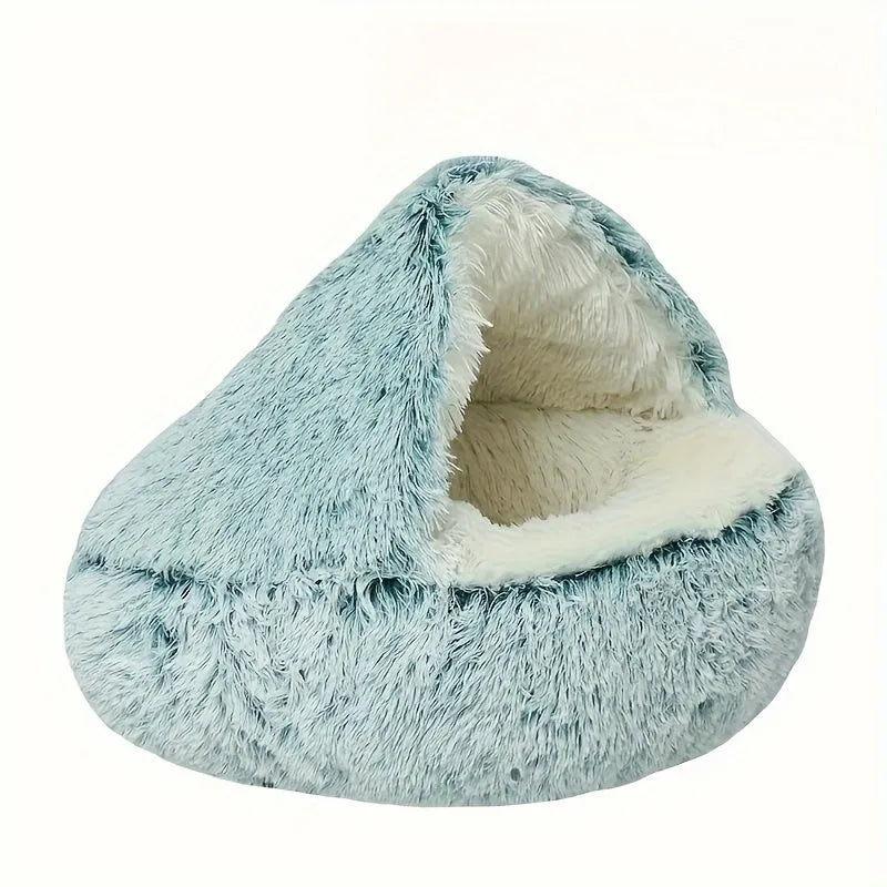 Soft blue plush Furb Cat Bed with a cozy interior, ideal for cats' comfort and warmth.
