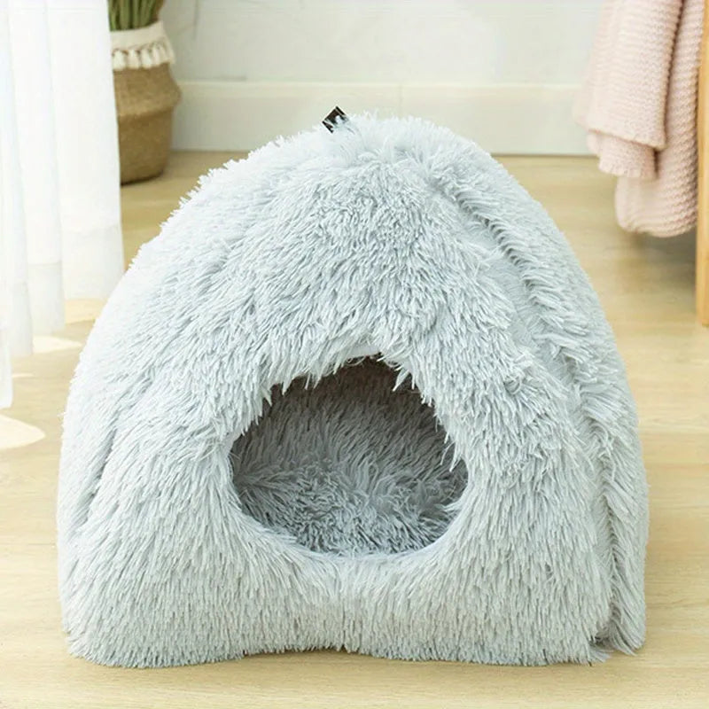 Gray cat heated bed with soft plush fabric, providing a cozy sleeping area for cats.