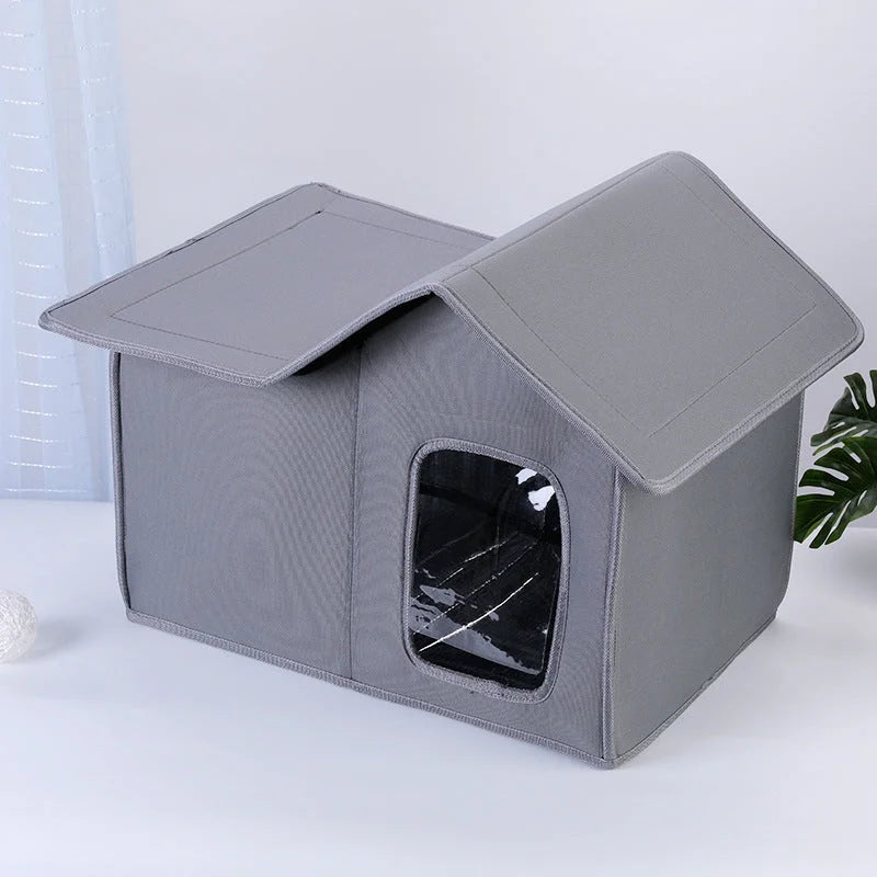 Gray stray cat house suitable for indoor or outdoor use, displayed in a clean environment