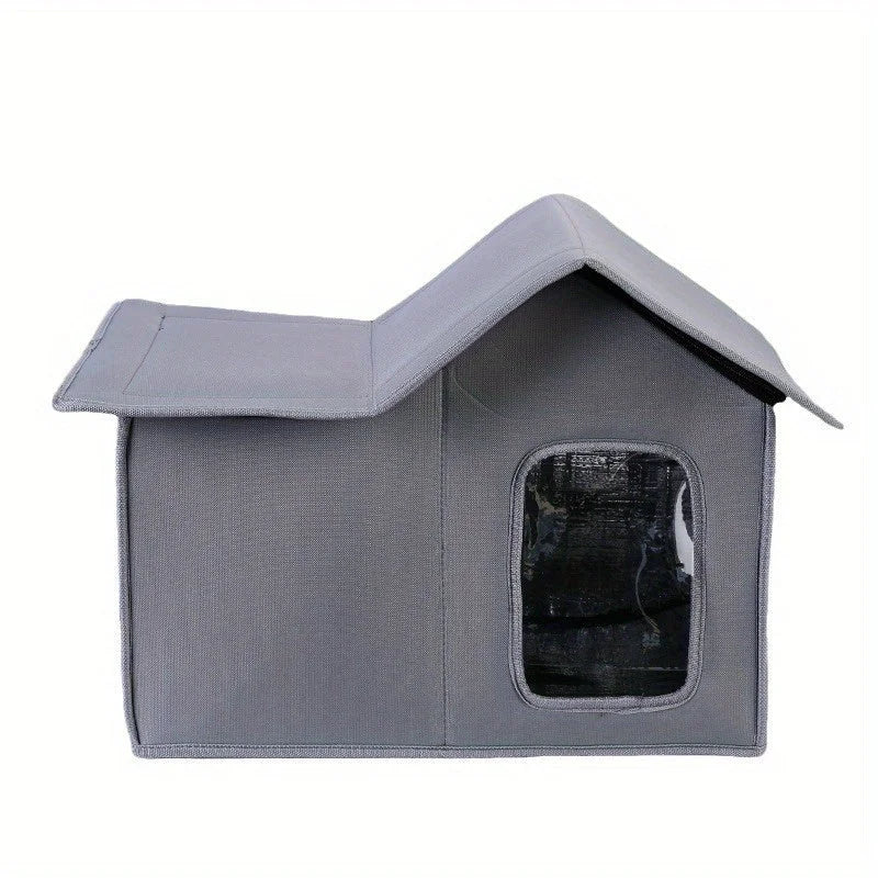 Gray stray cat house side view showcasing its design and window