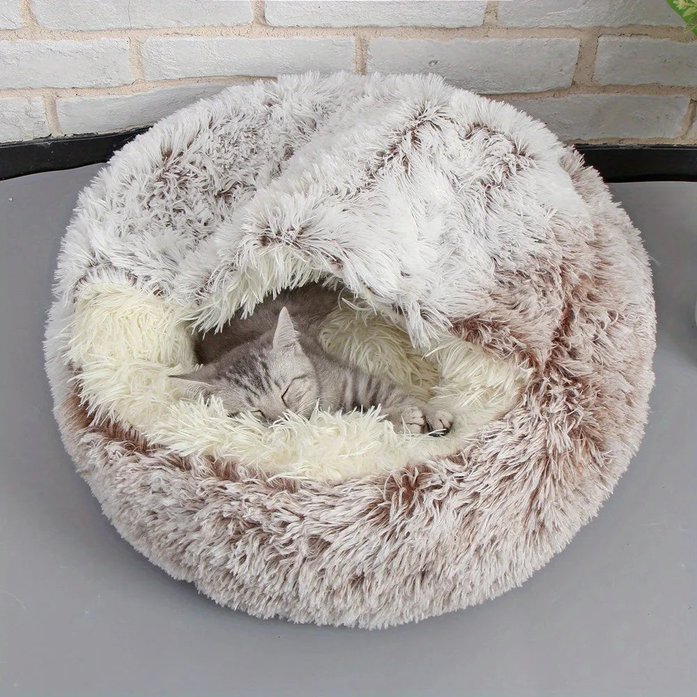 A plush brown cat bed providing a cozy haven for relaxation and warmth for your furry friend.