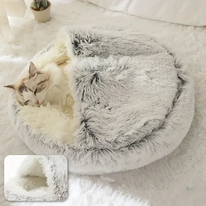 A luxurious gray cat bed with a cave-like design, ideal for cats who love to snuggle.