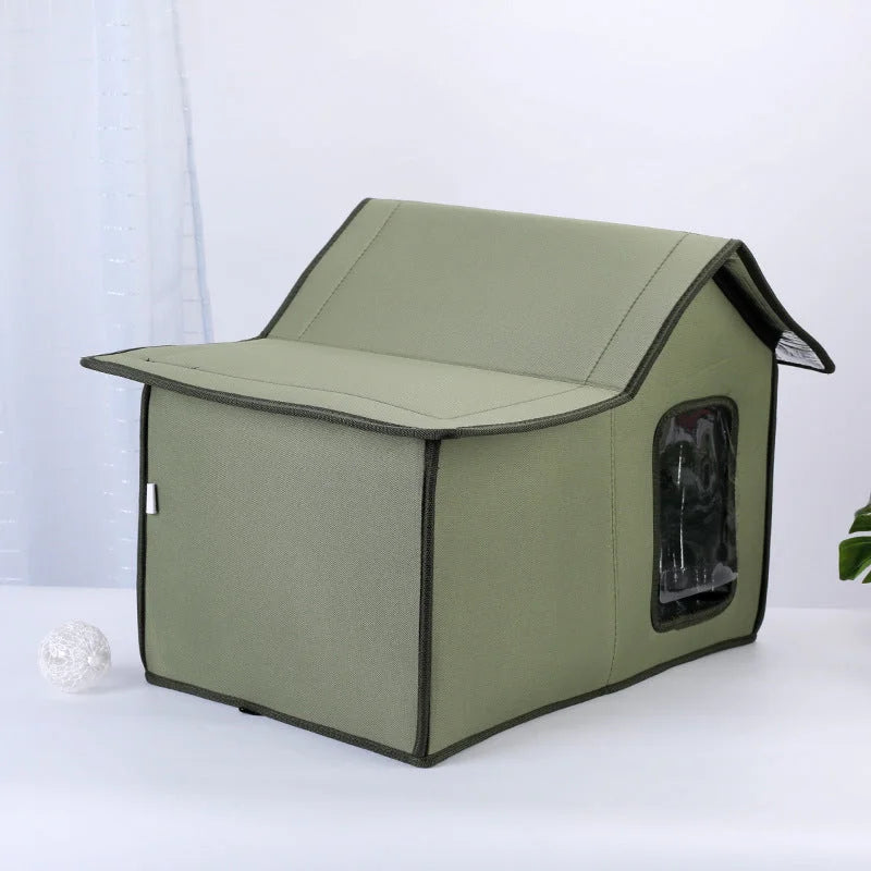 Gray stray cat house side view showcasing its design and window