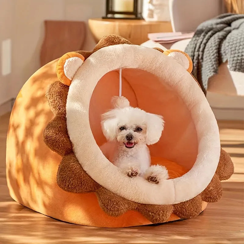 A small dog relaxing in a heated cat bed with a lion design.