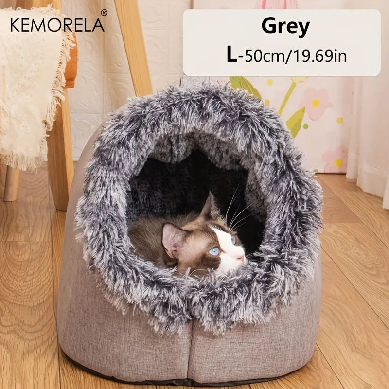 Portable heated cat bed, resembling a warm house, designed for maximum pet relaxation.