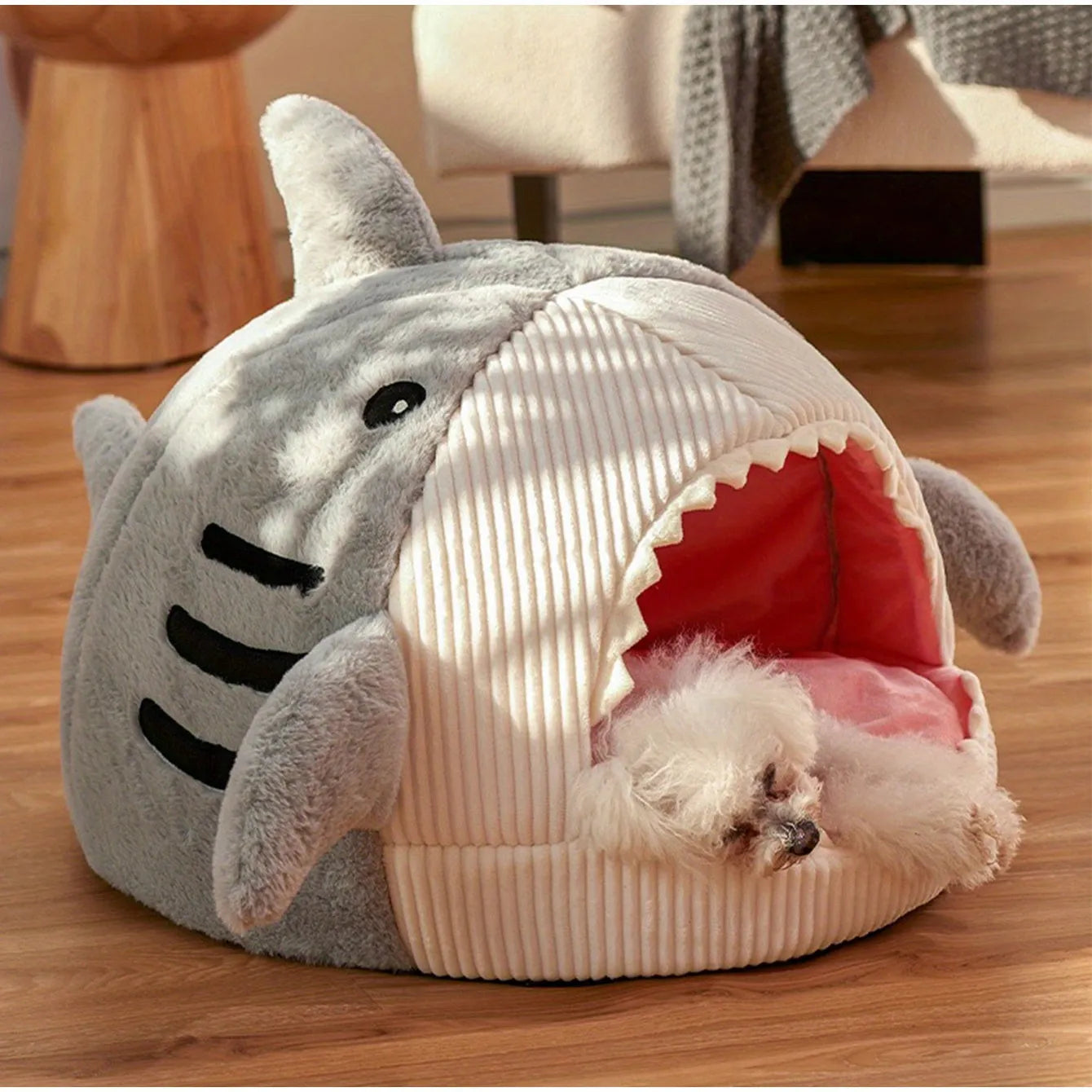 Plush shark-shaped large cat bed with soft pink interior for ultimate pet comfort.