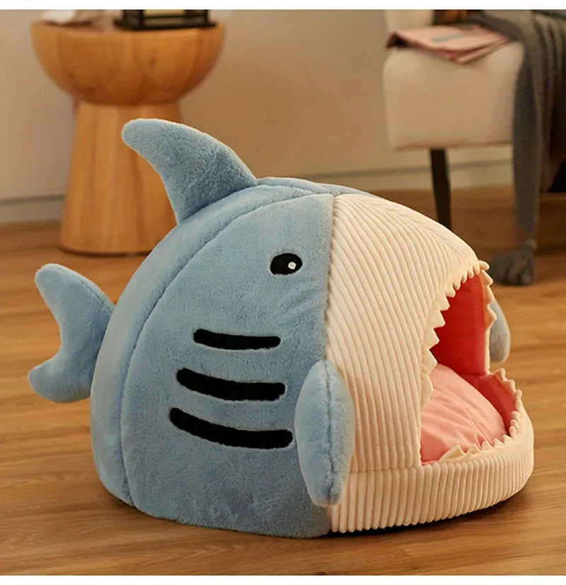 Unique large shark-shaped cat bed with plush interior and comfortable sleeping area for pets.