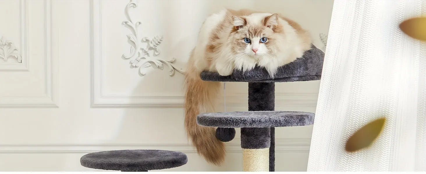 A luxurious spot for cats to relax on a stylish cat tree, harmonizing with Christmas trees for a festive look.