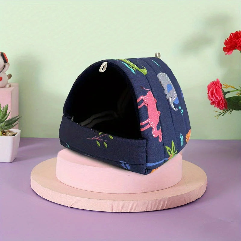 Navy blue cat play house with colorful animal patterns, perfect for small pets.