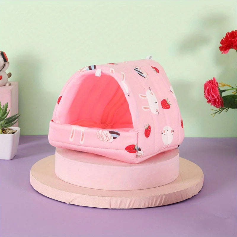 Pink cat play house featuring a strawberry and bunny theme for a cute touch.