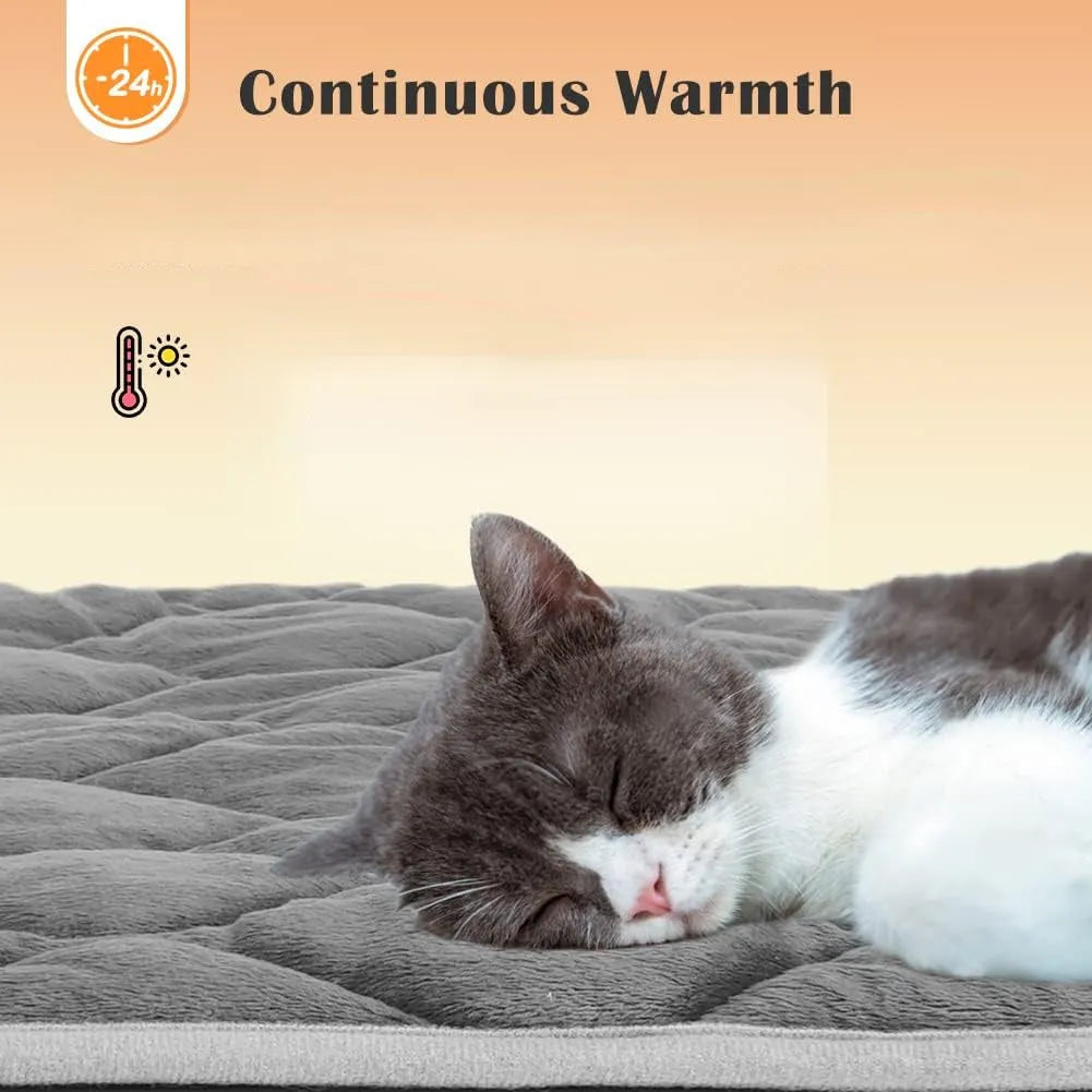 Cat sleeping soundly on a self-warming cat bed, designed for continuous warmth and comfort.