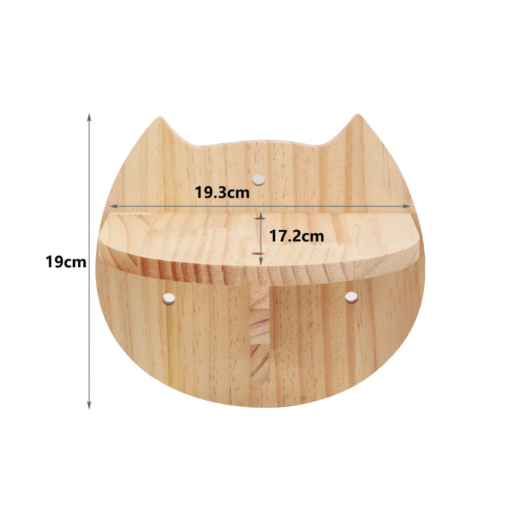 Small wooden perch with cat face design for wall climb setups.