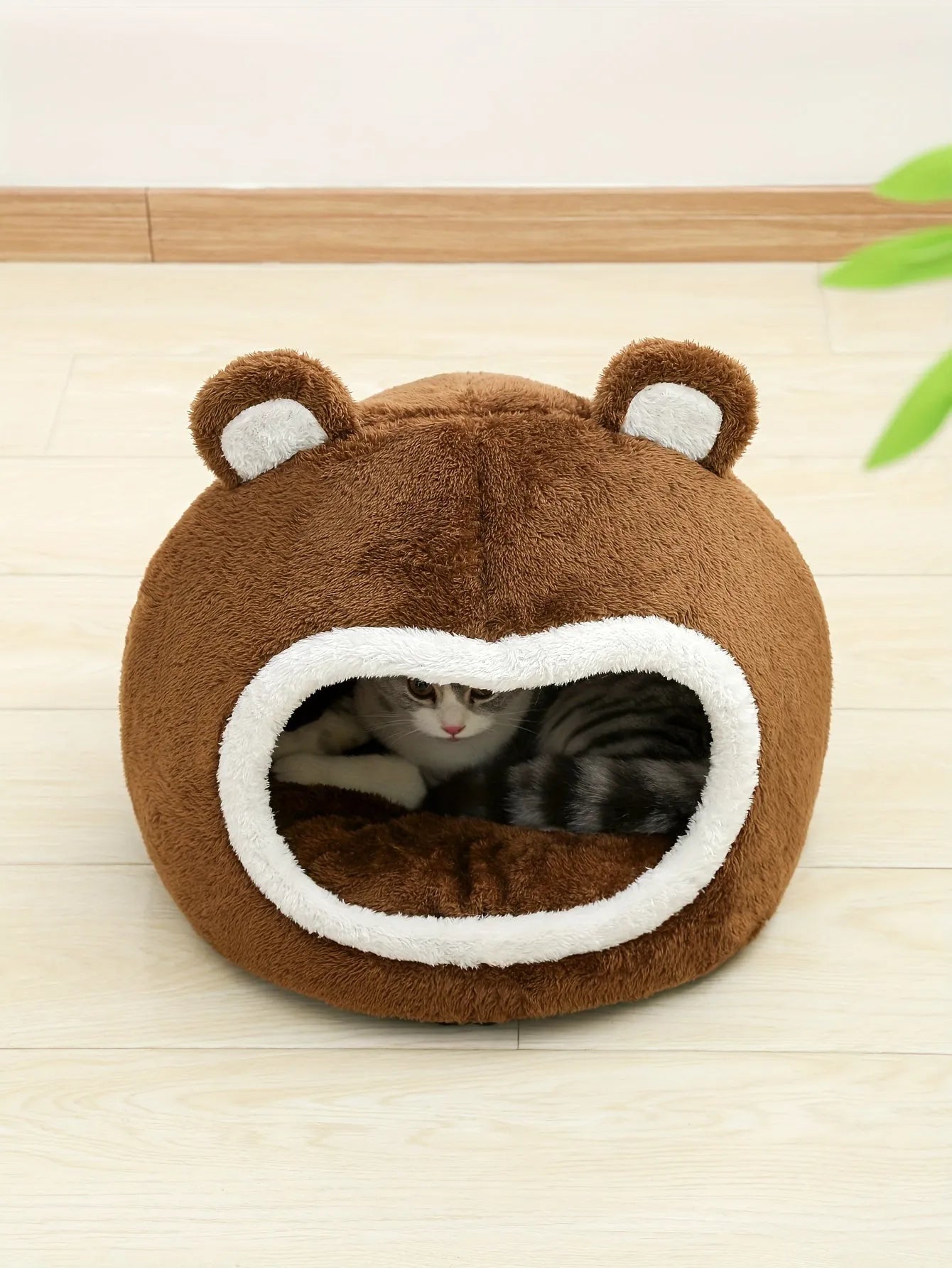 Warm cat bed in a bear design featuring plush material and a cozy interior